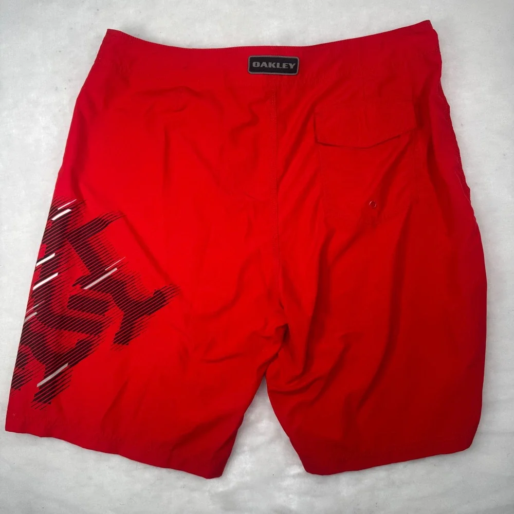 Oakley Board Shorts Mens Size 40 Red Spell Out Graphic Surf Swim Trunks